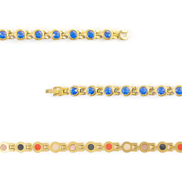 Close-up of Blue Belle bracelet showing round royal blue crystal set in each gold link.